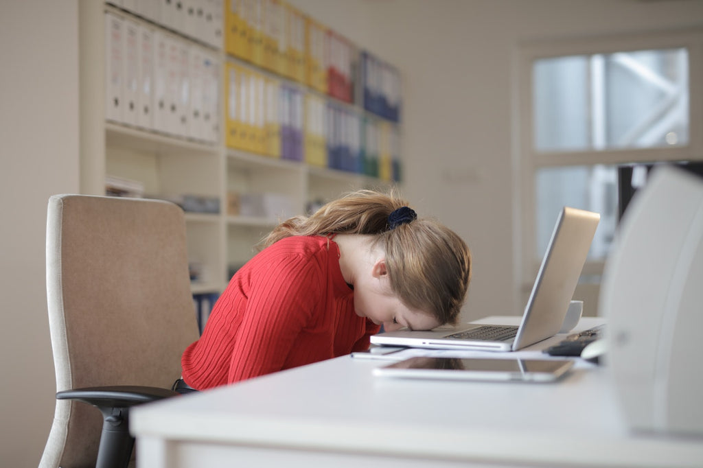 Young Woman at a Work Table